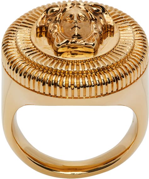 versace gold tone rings.